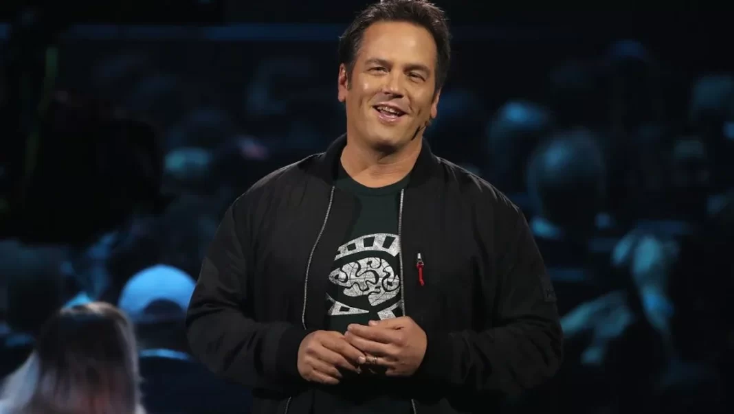 phil-spencer-wearing-a-black-jacket-and-smiling-while-talking-at-e3